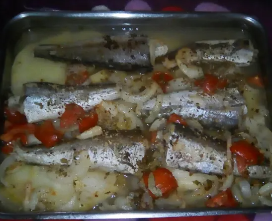Baked Hake recipe with potatoes and onion